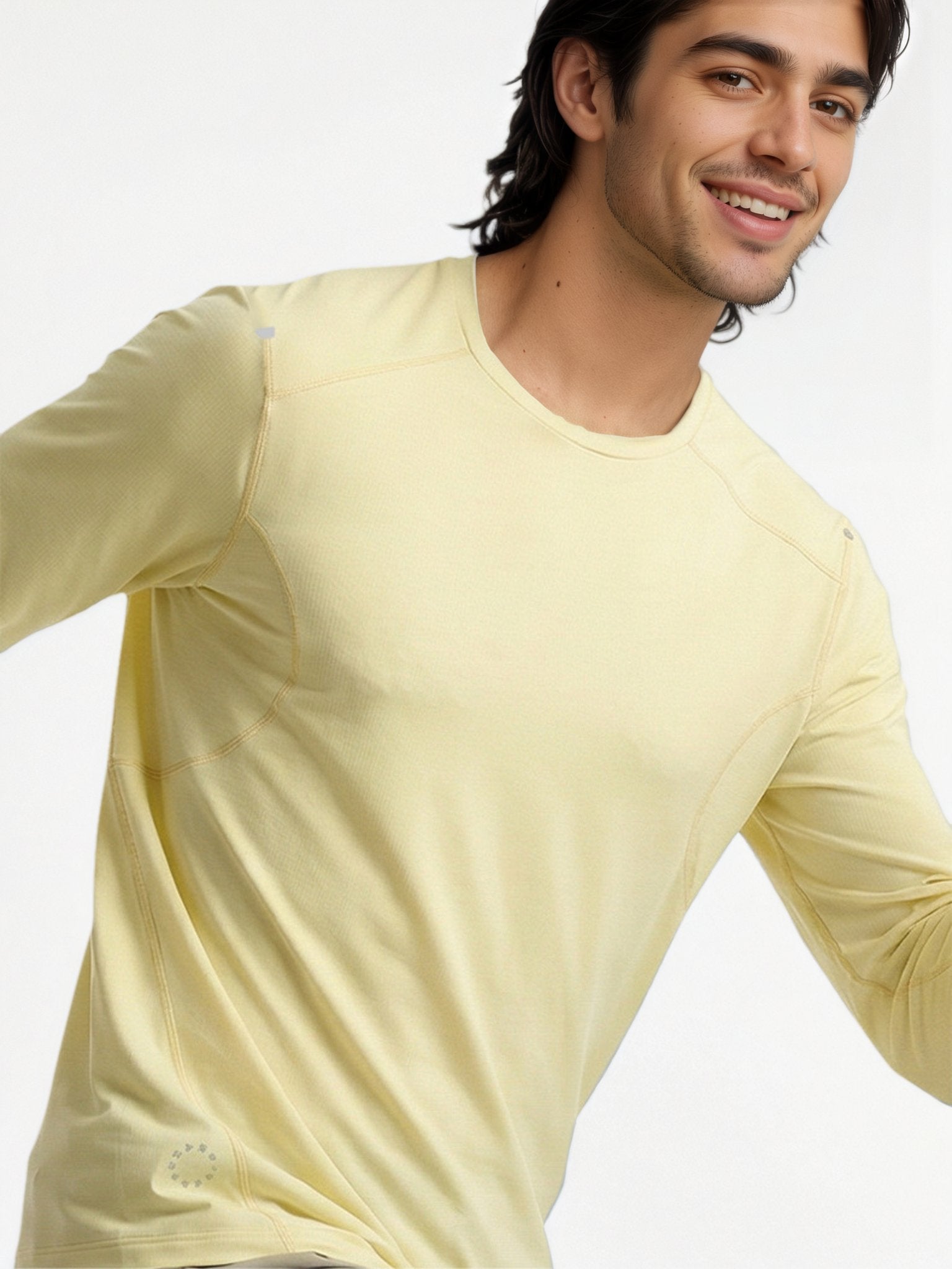 Performance long sleeve top lifestyle image 11: white yellow motion