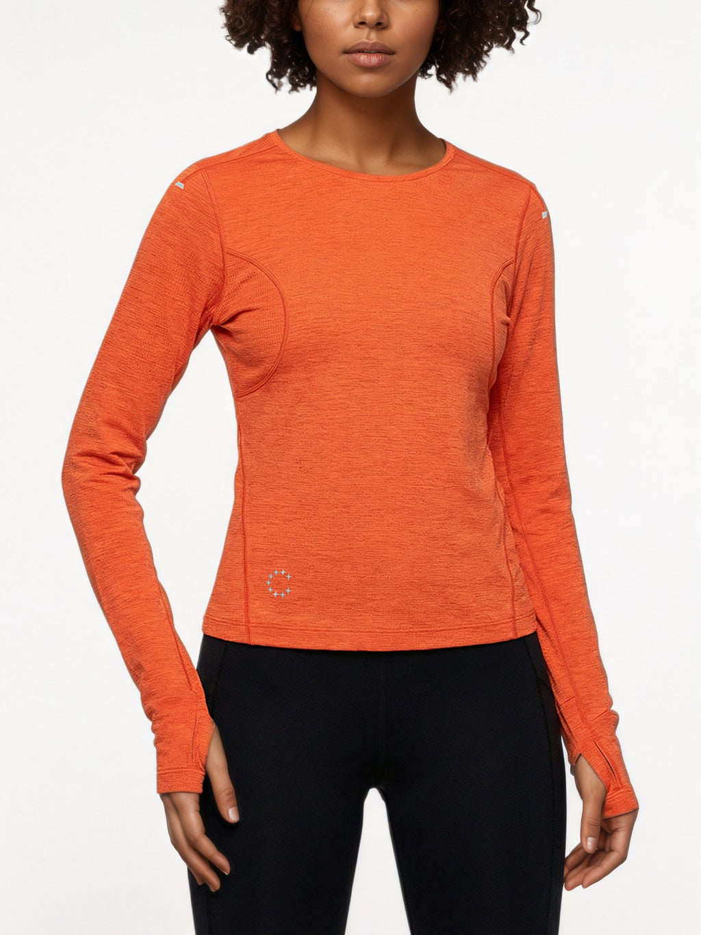 Performance long sleeve top lifestyle image 14: black orange standing